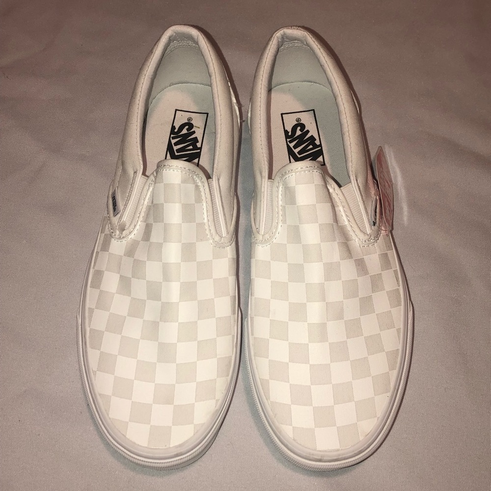 White Checker Vans Slip on
